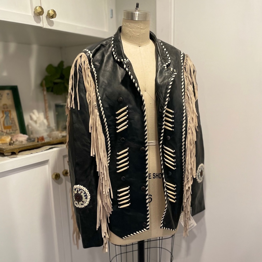 VINTAGE 3B West beaded and fringe leather jacket.